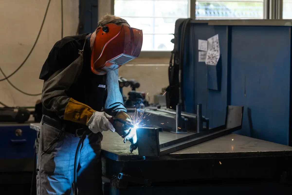 A welded assembly being put together